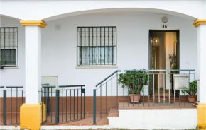 Awesome home in La Algaba with Outdoor swimming pool, WiFi and 3 Bedrooms